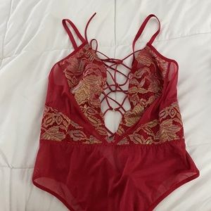 Red laced body suit